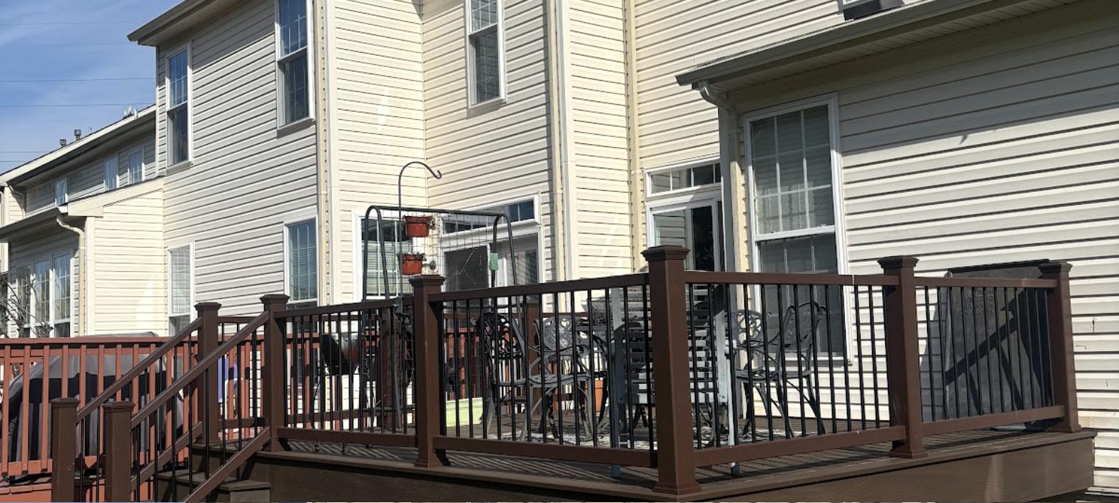 Custom wood deck build with railing by RC Deck Co